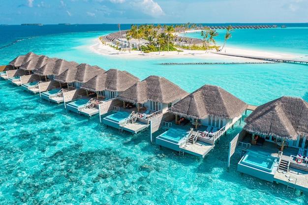 Turquoise water and overwater villas in the Maldives
